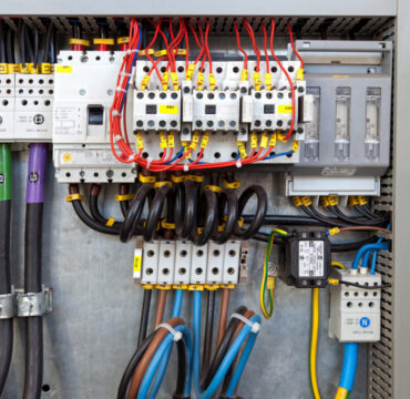 Electrical panel at a assembly line factory. Controls and switches.